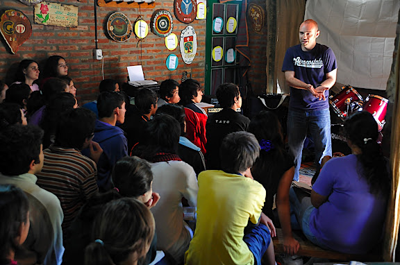 Sasha preaching at camp