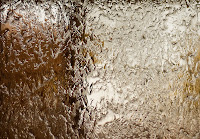 Liquid Gold: This image is actually a crop from a photo of a waterfall mirror. A few color temperature adjustments later, and this came out. (1/2000 sec @ f/1.8; 50mm)