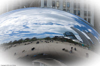 Bean as a Mirror: The Bean in Millenium Park with the scene around it reflected to the lens. Notice the birds sitting on it too - apparently they really like to rest on this piece of art. (1/1000 sec @ f/4; 70mm)