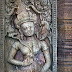 Sikhoraphum's south devata shares many powerful attributes with her 1,780 sisters at Angkor Wat. For example, her pose, jewelry and long stemmed lotus flower are similar. But there are variations in the crown and the abundance of animals is quite unique. Read the full story on http://www.devata.org
