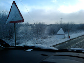 Obliterated Roadwork Signs on A361 near Knowstone, around 8.15am