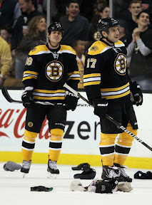The hats rain down on the ice after Milan Lucic's hat trick goal