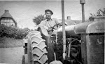 Ted Keep on tractor. From Mrs Keep's album.