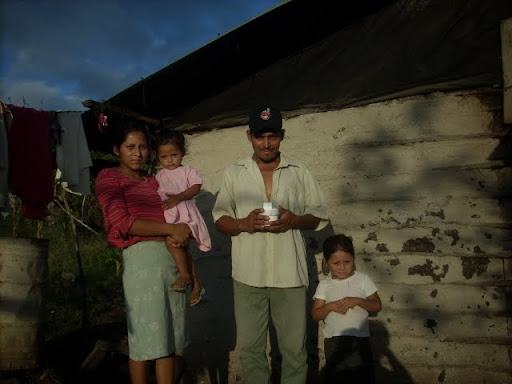 Santos Federico and His Family with a Solar Lamp