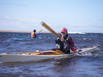 The amazing purple bonnie, bonnaroo perry surfing in the mouth of the Michipicoten river.