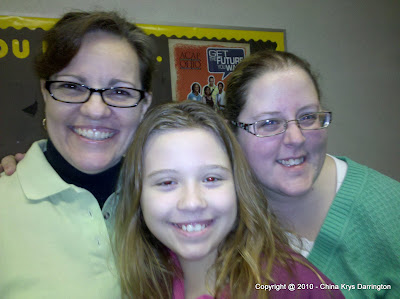 Coach Hall, Mia Darrington & Coach Boyd at the Akron District Science Fair