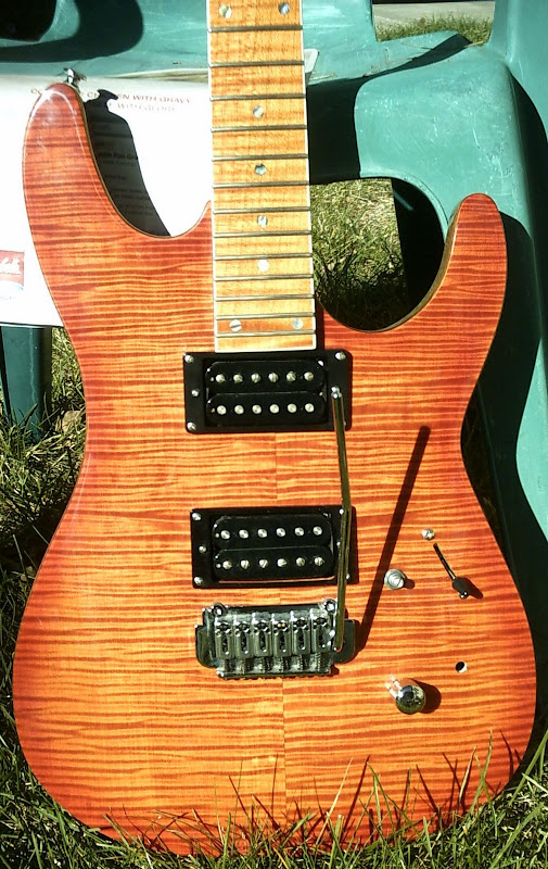Anderson/Suhr type guitars. Orange flame body/neck 155 Harmony Central