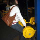 Kate testing her weight lifting ability if she was on Jupiter.