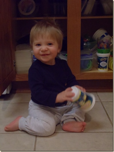 Brian playing in cabinet