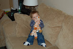 Owen at 10 months with his friend, George the giraffe