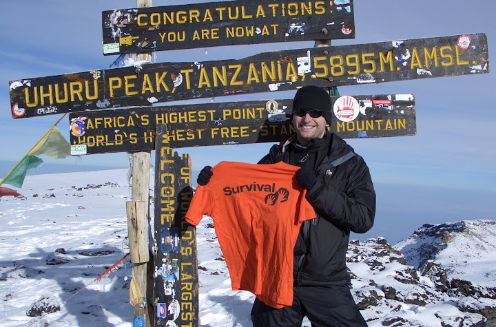 Malcolm Russell reaches the summit of Mount Kilimanjaro, 2009