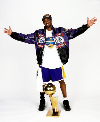 JUNE 16: Kobe Bryant #8 of kobe bryant championship trophy. JUNE 16: Kobe Bryant #8 of