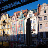 Back in the square. We're probably hungry, looking for a place to eat. Back in the square. We're probably hungry, looking for a place to eat.
