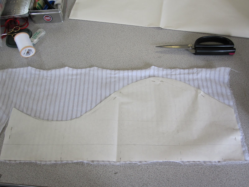 Cutting a toile using pattern piece for the cuff Cutting a toile using pattern piece for the cuff