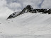 pico del alba y huellas de descenso y ascenso