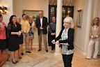 Julia Duffy opening her gift from the city
