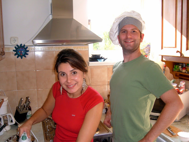 Dutiful Wife and Buddy Working Away in the Kitchen