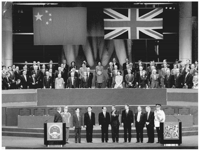 Britain Returns the Sovereignty of Hong Kong to the People's Republic of China. When Hong Kong reverted to Chinese sovereignty on July 1, 1997, leaders from both nations attended the flag-raising ceremony. In the foreground (left to right) are Tung Chee-hwa, Zhang Wan Nian, Qian Qichen, Li Peng, Jiang Zemin, Prince Charles, Tony Blair, Robin Cook, Chris Patten, and Brian Dutton. 