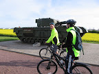 Richard laughs at John for getting a tank stuck to his helmet.