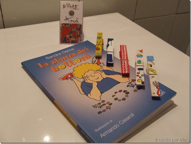 Il libro e le mollette Il libro e le mollette