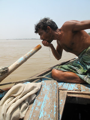 Boat man drinks the water! it is clean!