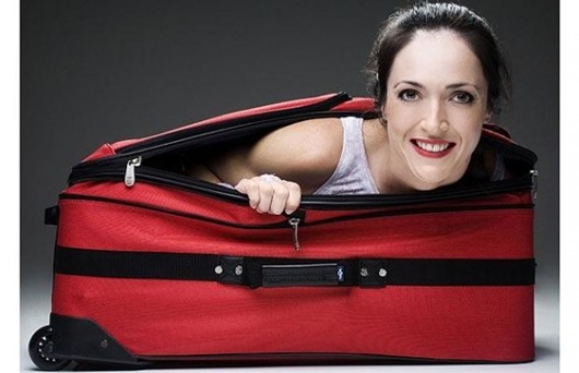 woman-in-suitcase-588x379