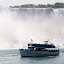 Maid of the Mist passing the American Falls.