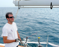 Bi-State Regatta 2009 / Bi-State 2009: Sunday race from St. Joseph to Chicago:  Paul trimming main on Vayu