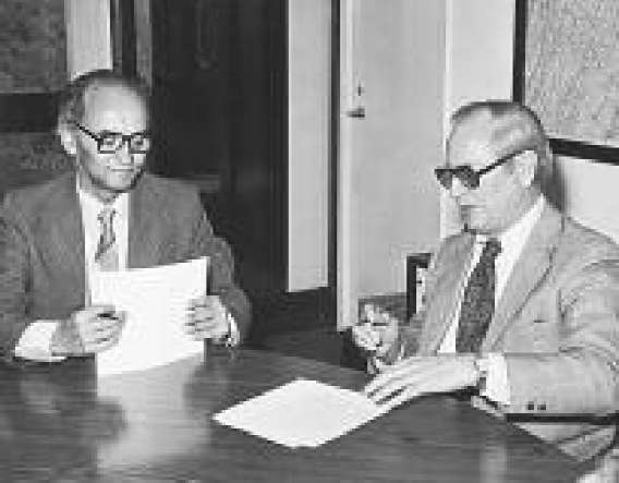 William Menard (right) in his administrative role as the chief of the U.S. Geological Survey with Dr. Oskar Adam in 1979 