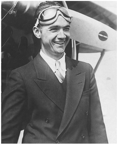 The American millionaire businessman, film director, and aviator, Howard Hughes, in his flying goggles, 1936. 