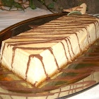 Nº103: Flan de coco sobre miel de ulmo y con salsa de chocolate.