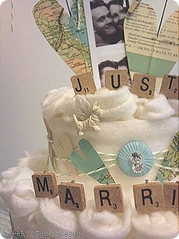 Emma designed her own wonderful and fat free wedding cake topper using 
