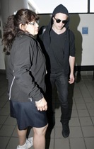 Robert Pattinson Catching A Flight At LAX