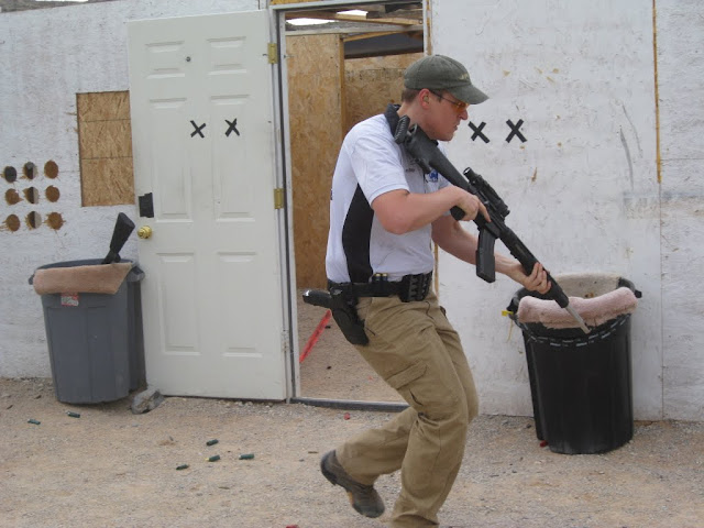 Me with a rifle on a memory stage.