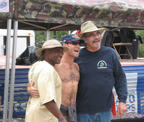 Marcus collects his medal from TC and Pete.