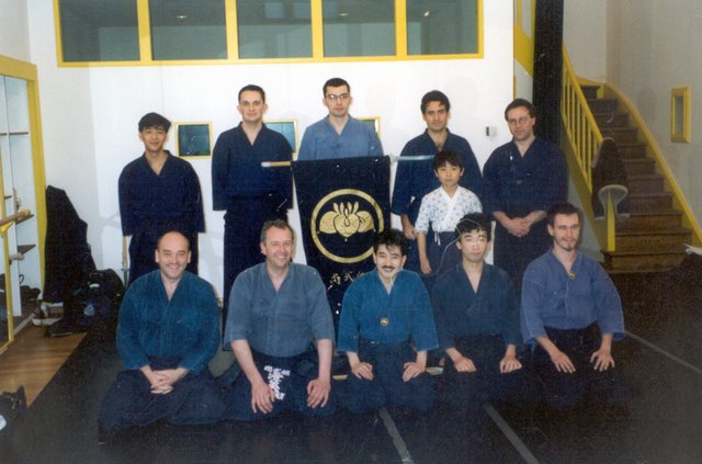 The first steps of the Shobukai Kendo Club of Luxembourg. The founding members are: Robi HEIDERSCHEID (front row 1st from left), André CLERBAUT the first president of the club (front row 2nd from left), Dominique GERARD (front rwo 1st from right), and Norbert HANCK (back row 1st from right).