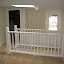 Looking at the stairs to the attic.