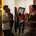 Behind our set walls, director Lindsay Mann talks with actor Daniel Genalo