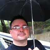 Geocaching in the rain. "Weddings, Parties, Anything" Geocache