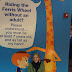 Kaykins is too short for the Ferris Wheel in the Toys"R"Us store in Times Square.