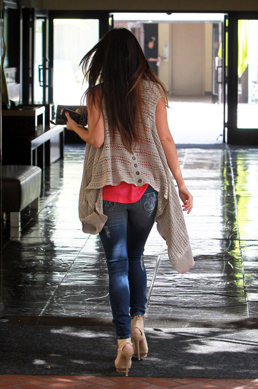 megan fox 90327007 Megan Fox Wearing Tight Jeans and a Pink Blouse