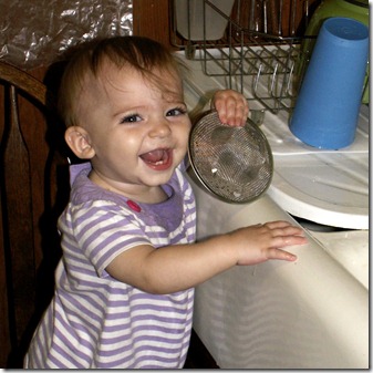 Elaine 10 months washing dishes