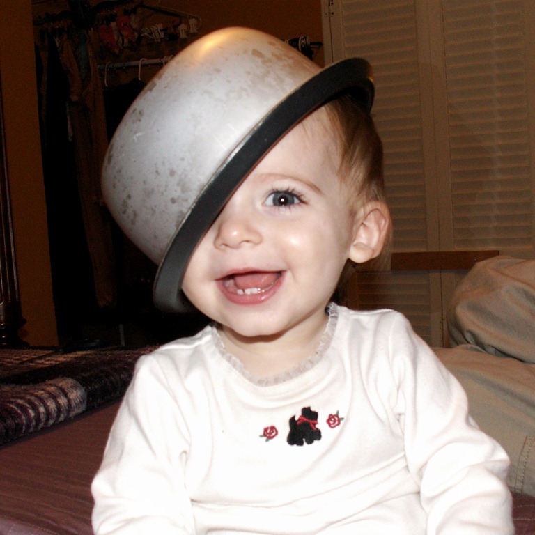 [Elaine with rice cooker on her head_0002[5].jpg]