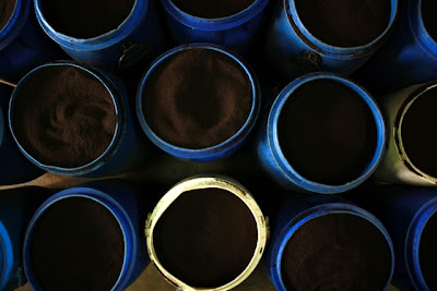 Buckets of tea at a Sri Lankan Ceylon tea factory