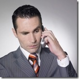 Man upset while talking on this cell phone