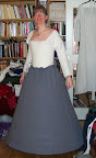 The seamstress in her underpinnings