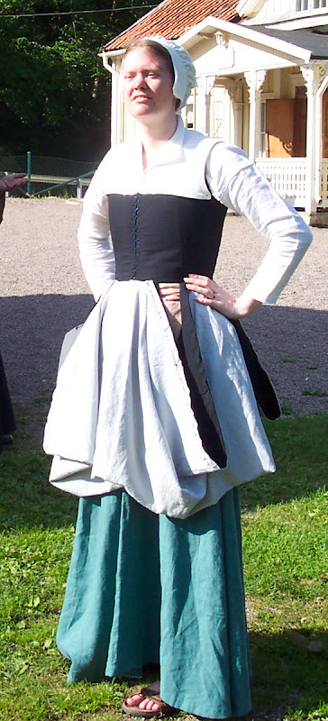 Skirt tucked up from the front