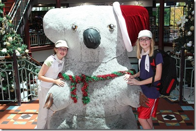 Sophie and Laura in front of Christmas koala