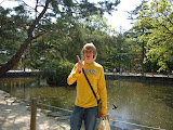Standing in front of a pond