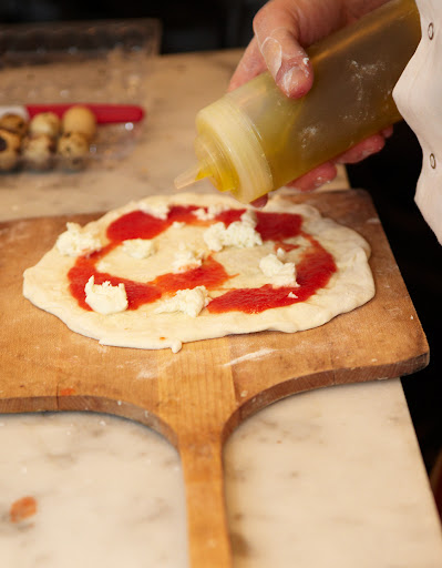 Just the right amount of sauce, buffalo mozzarella, and fruity olive oil